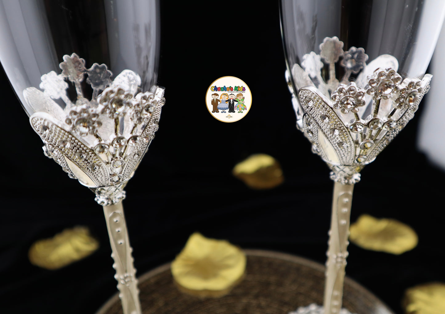 Decorative Wedding wine glasses with intricate designs on a dark background