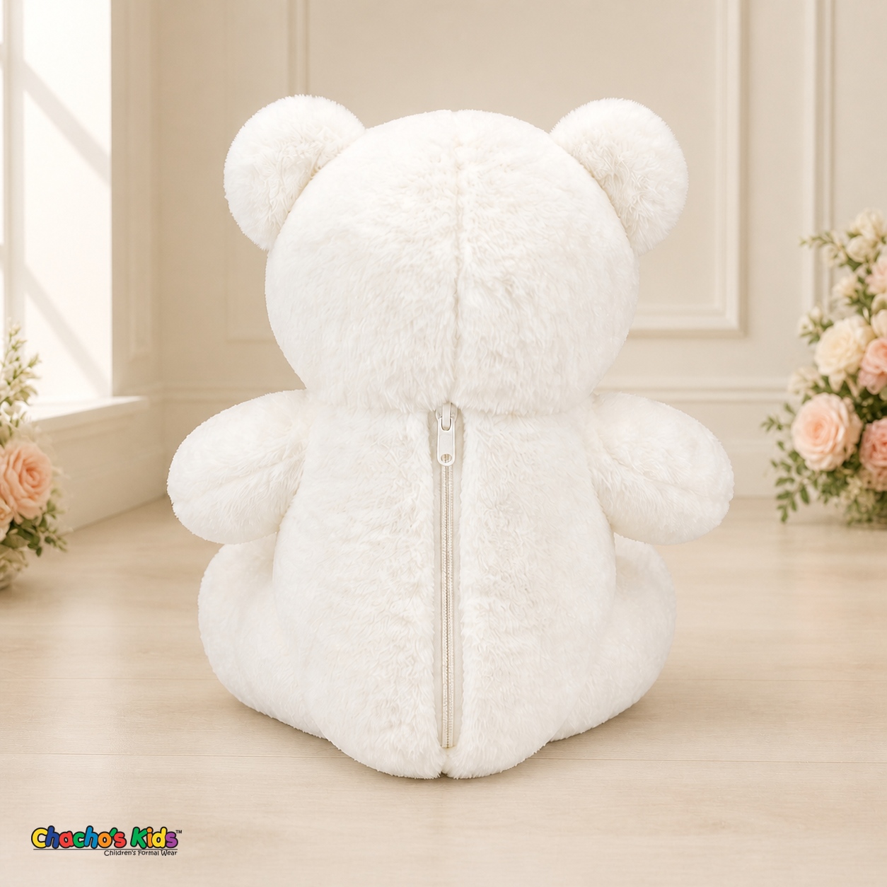 Back view of white Mini Quince teddy bear dress display showing centered zipper in elegant cream floral interior