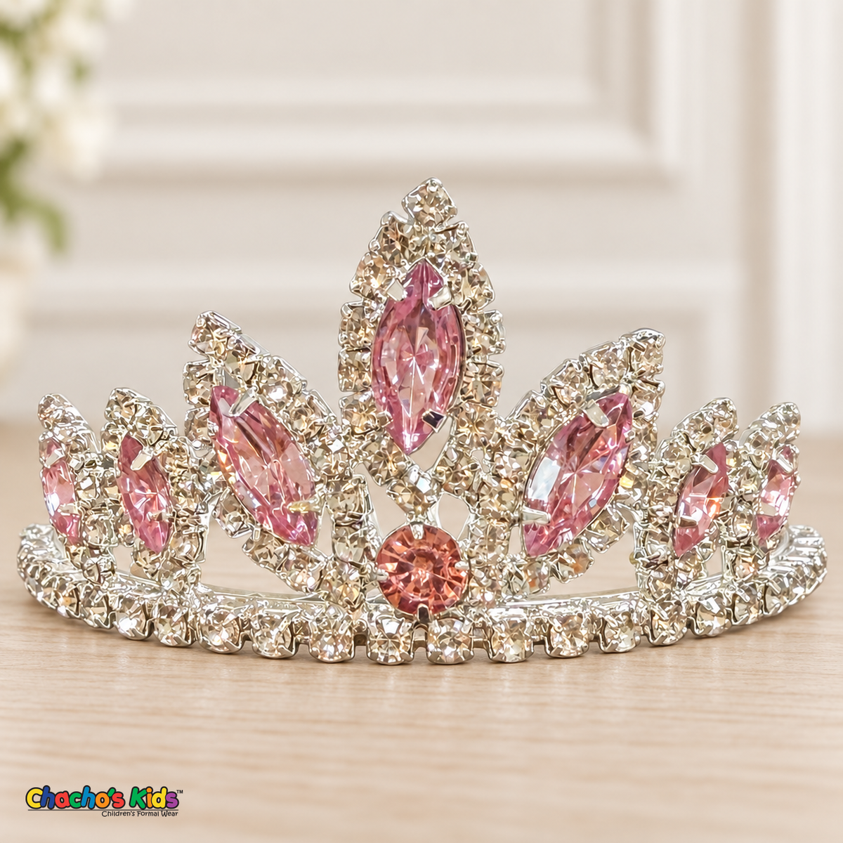 Girls Princess Tiara (0564) in Pink/Silver, full close-up with faceted stones, clear rhinestones and a silver-tone setting.
