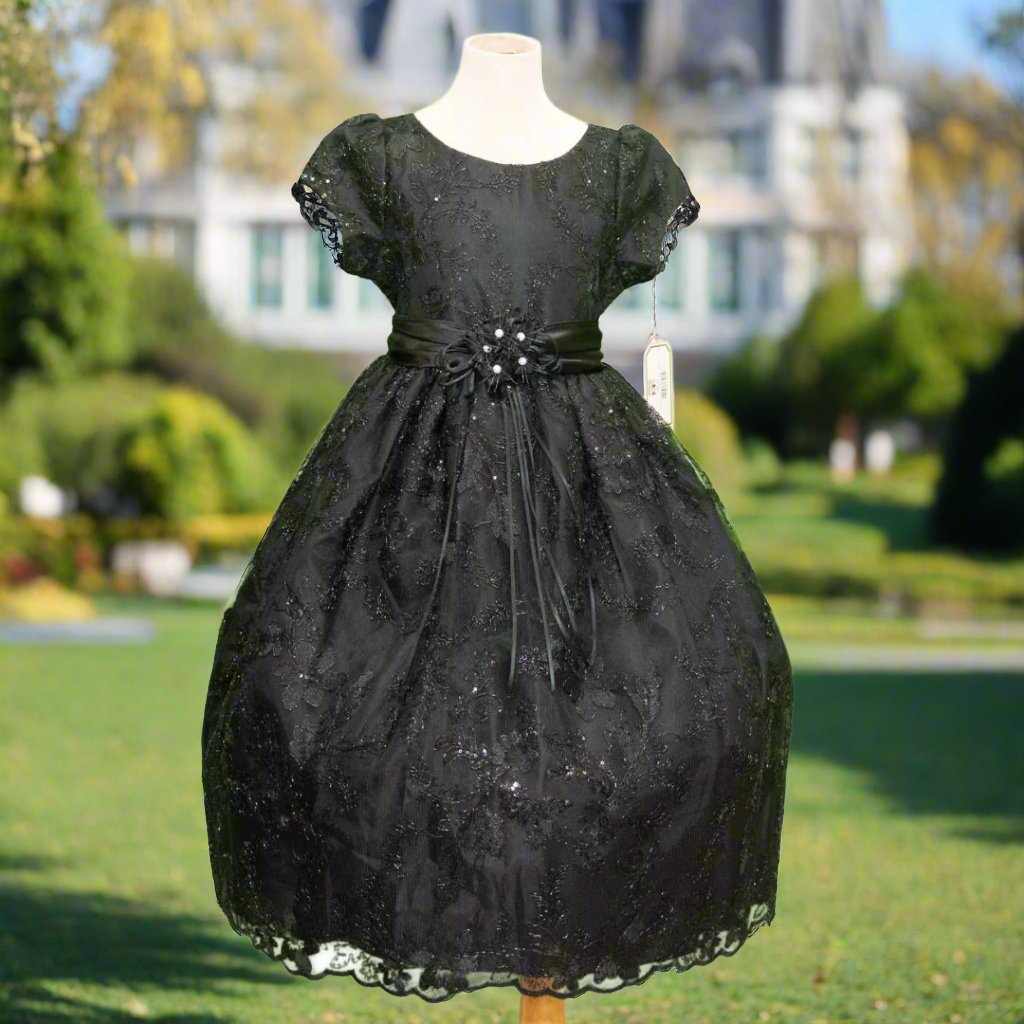 Black embroidered flower girl dress with satin bow, cap sleeves and full tulle skirt