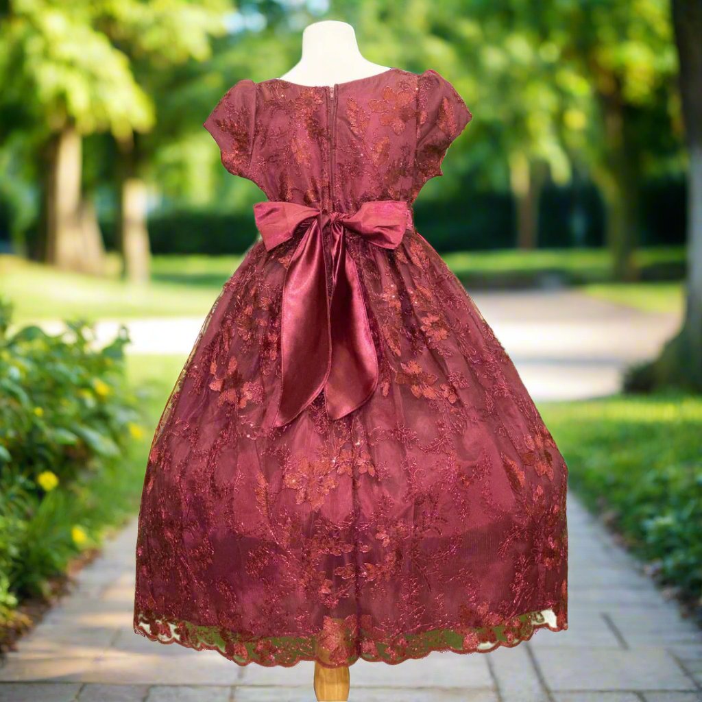 Burgundy embroidered flower girl dress detail with floral bodice and full skirt