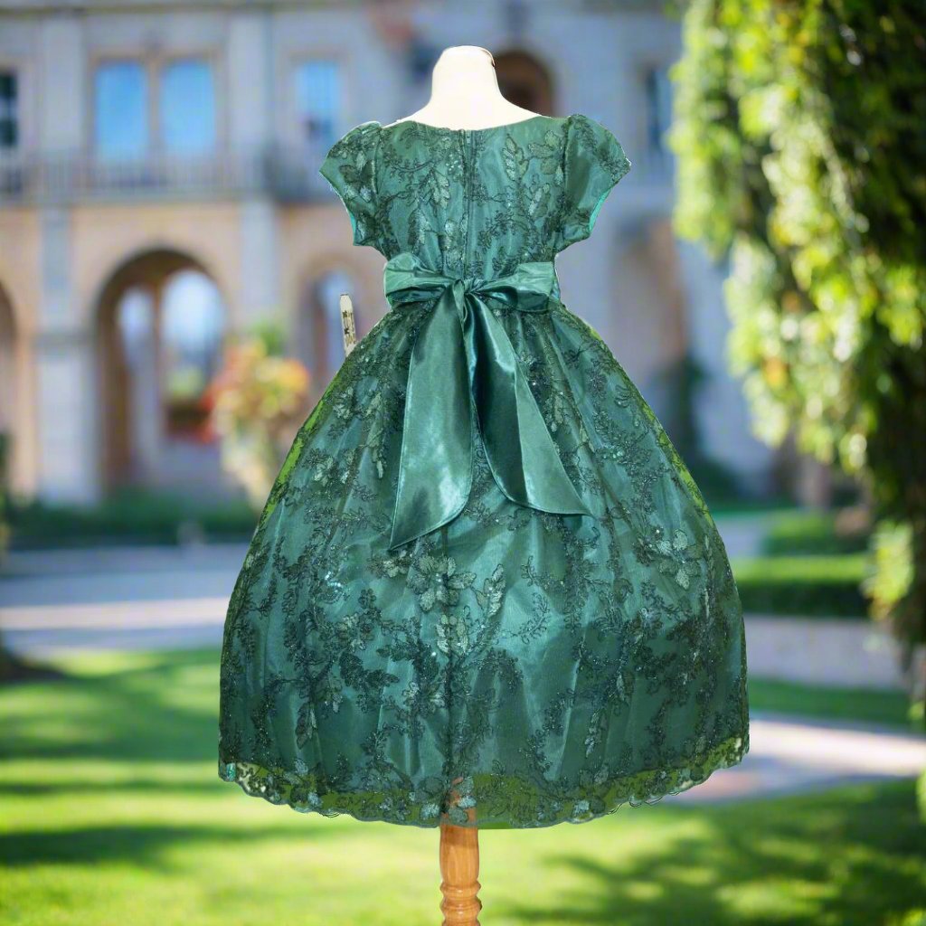 Emerald green embroidered flower girl dress detail with floral bodice and full skirt