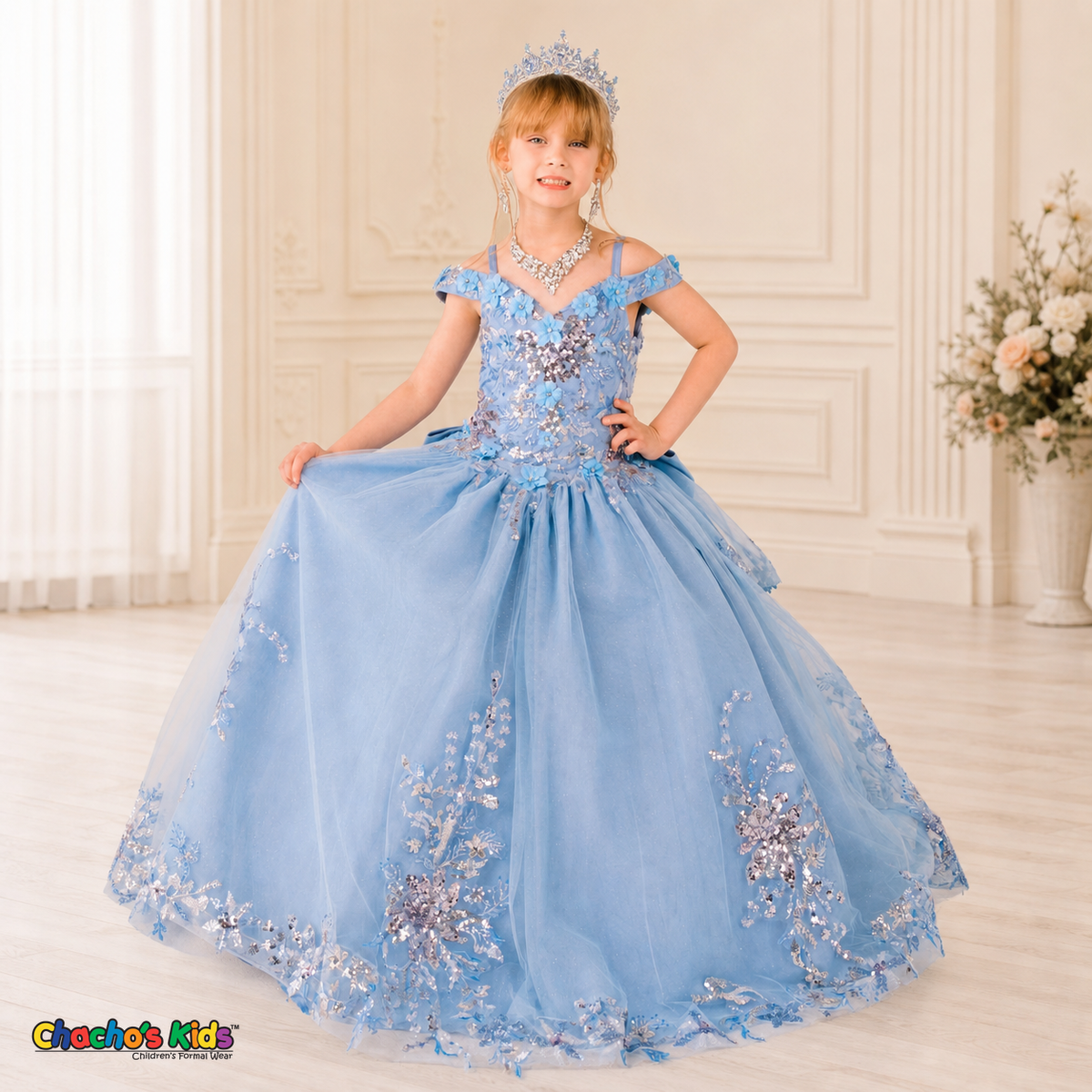 Victoria Blue mini quince ball gown on a girl model with floral sequin embroidery, off-shoulder neckline, and full tulle skirt, style 8125