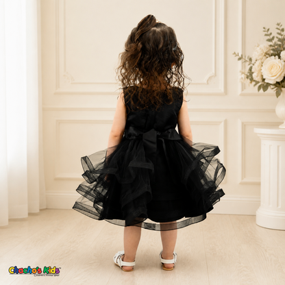 Back view of black 9149B baby flower girl dress with satin sash bow and layered tulle skirt