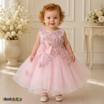Pink baby flower girl dress 9166B with silver sequin floral embroidery, butterfly details, side bow, and layered glitter tulle skirt on a toddler model