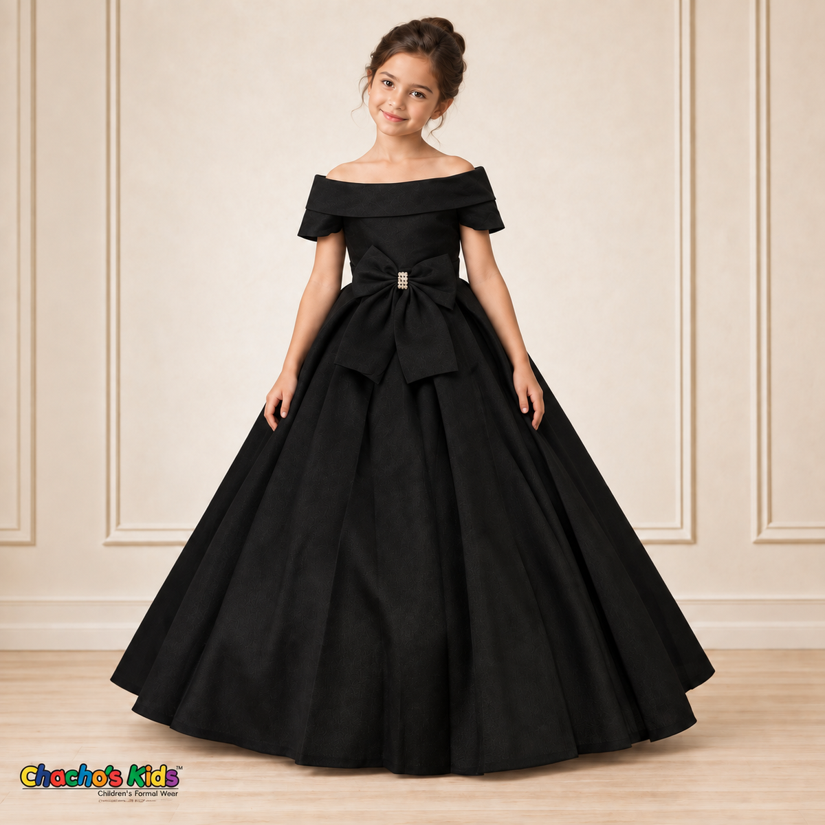 Black ball gown dress, style 9177, alternate front pose on a child model with a folded neckline, jeweled waist bow and full floor-length skirt.