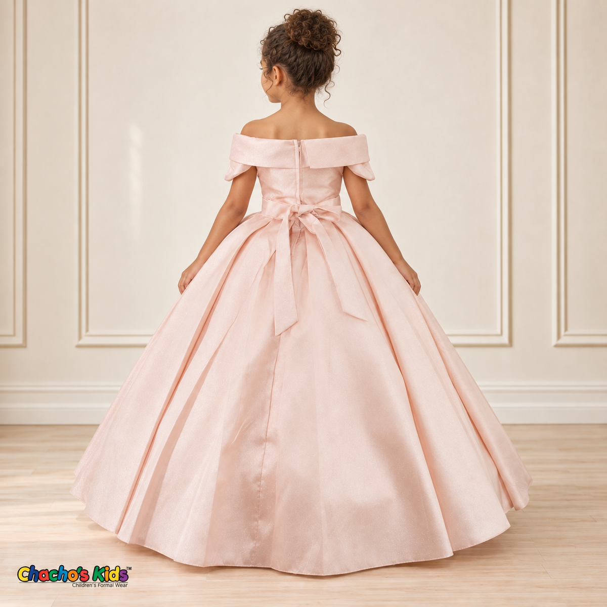 Blush ball gown dress, style 9177, back view on a child model with a back zipper, tied waist sash and full floor-length skirt.