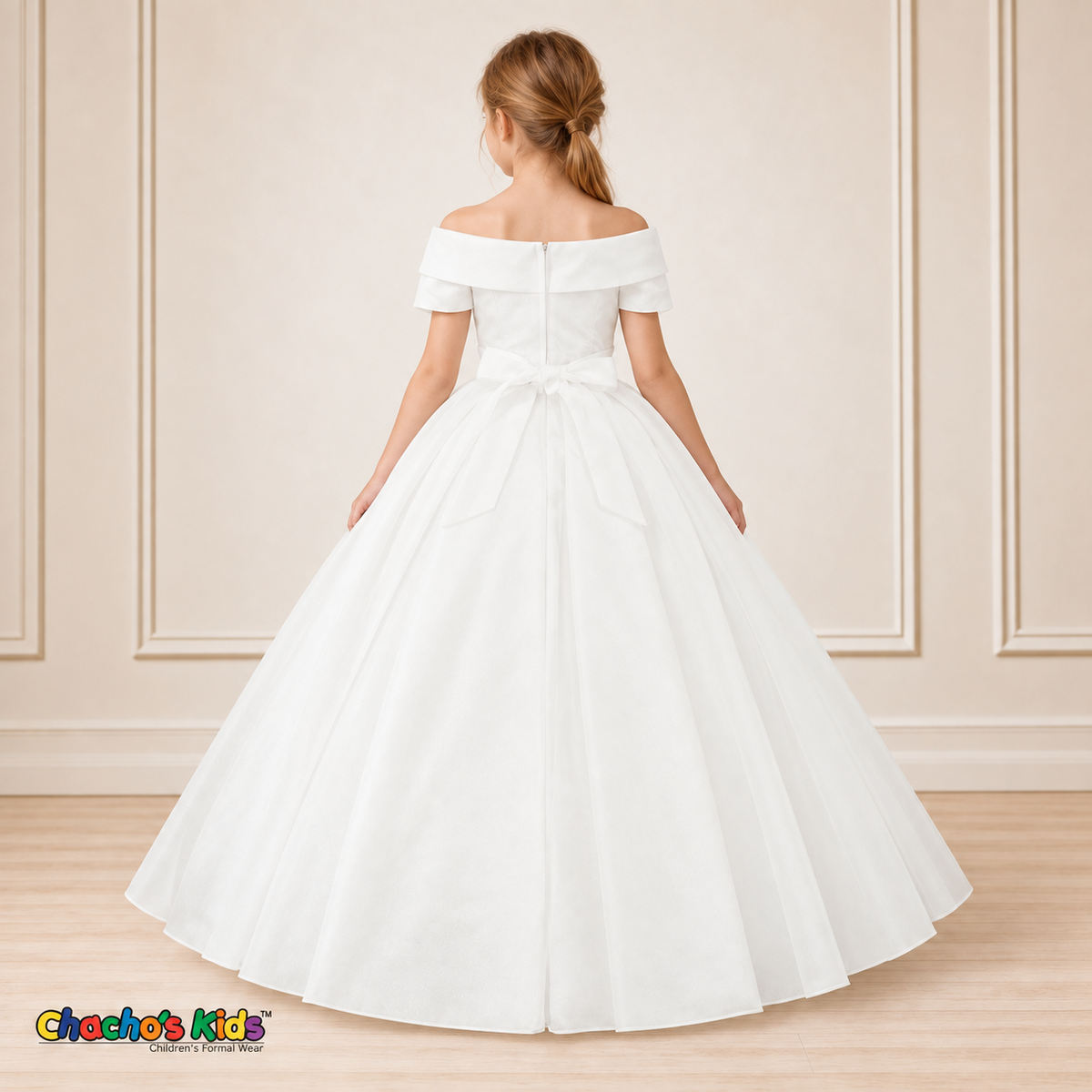 White ball gown dress, style 9177, back view on a child model with a back zipper, tied waist sash and full floor-length skirt.