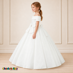 White ball gown dress, style 9177, left-facing side view on a child model with a folded neckline, jeweled waist bow and full floor-length skirt.