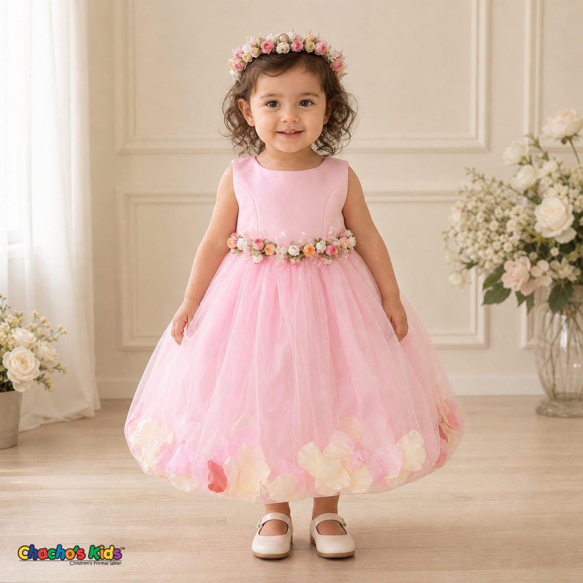 Pink D1095 baby flower girl dress with floral waist and petal-filled tulle skirt on toddler model