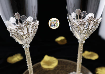 Decorative Wedding wine glasses with intricate designs on a dark background