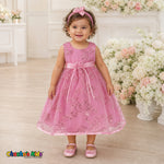 Baby girl wearing pink embroidered sequin flower girl dress with floral waist detail, style 1597