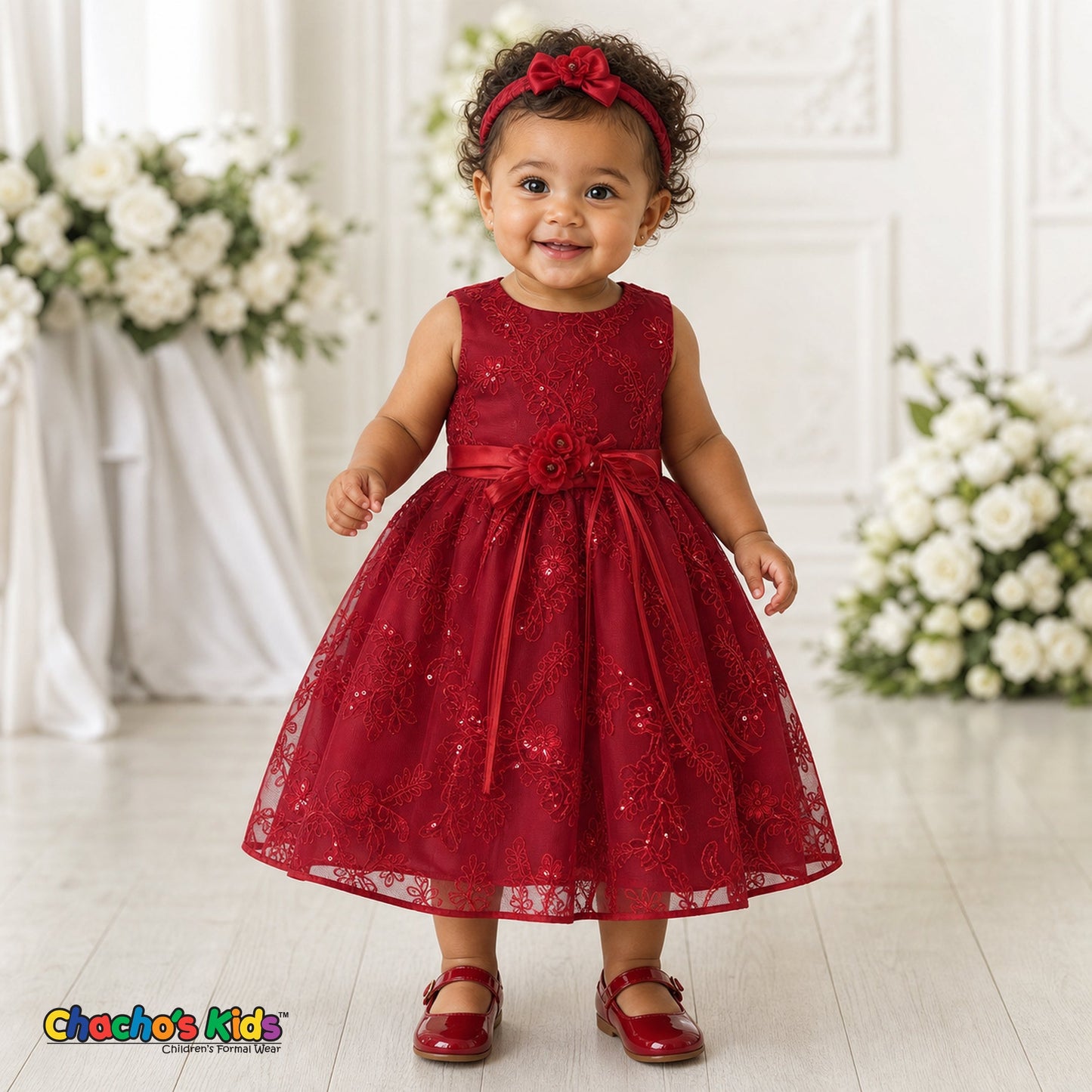 Baby girl wearing red embroidered sequin flower girl dress with floral waist detail, style 1597