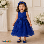 Baby girl wearing royal blue embroidered sequin flower girl dress with floral waist detail, style 1597