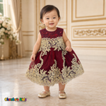Burgundy Baby Sophie luxury party dress with gold lace and glitter tulle modeled by a toddler - Chacho's Kids