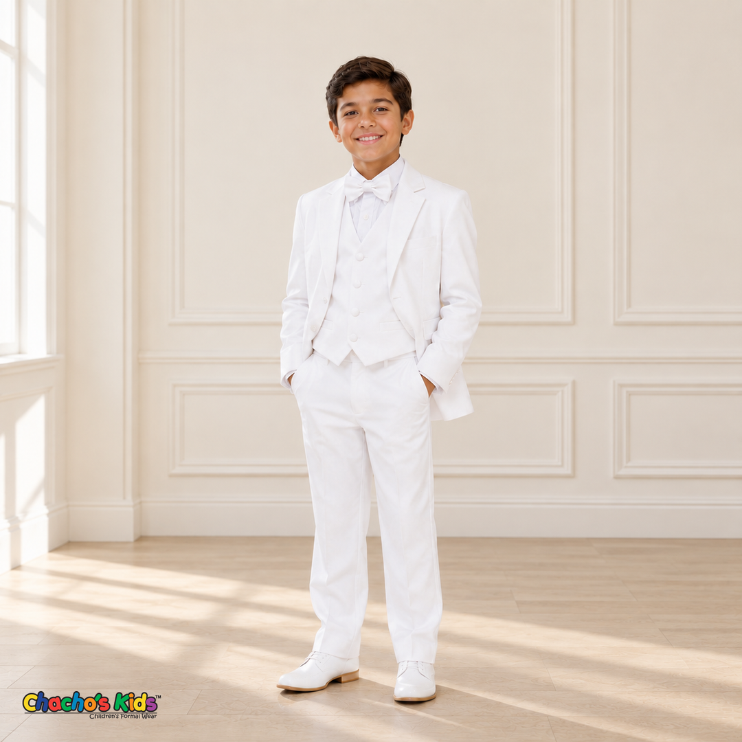 Boys Signature Tuxedo in White (BY010), front view with hands in pockets, white vest and bow tie.