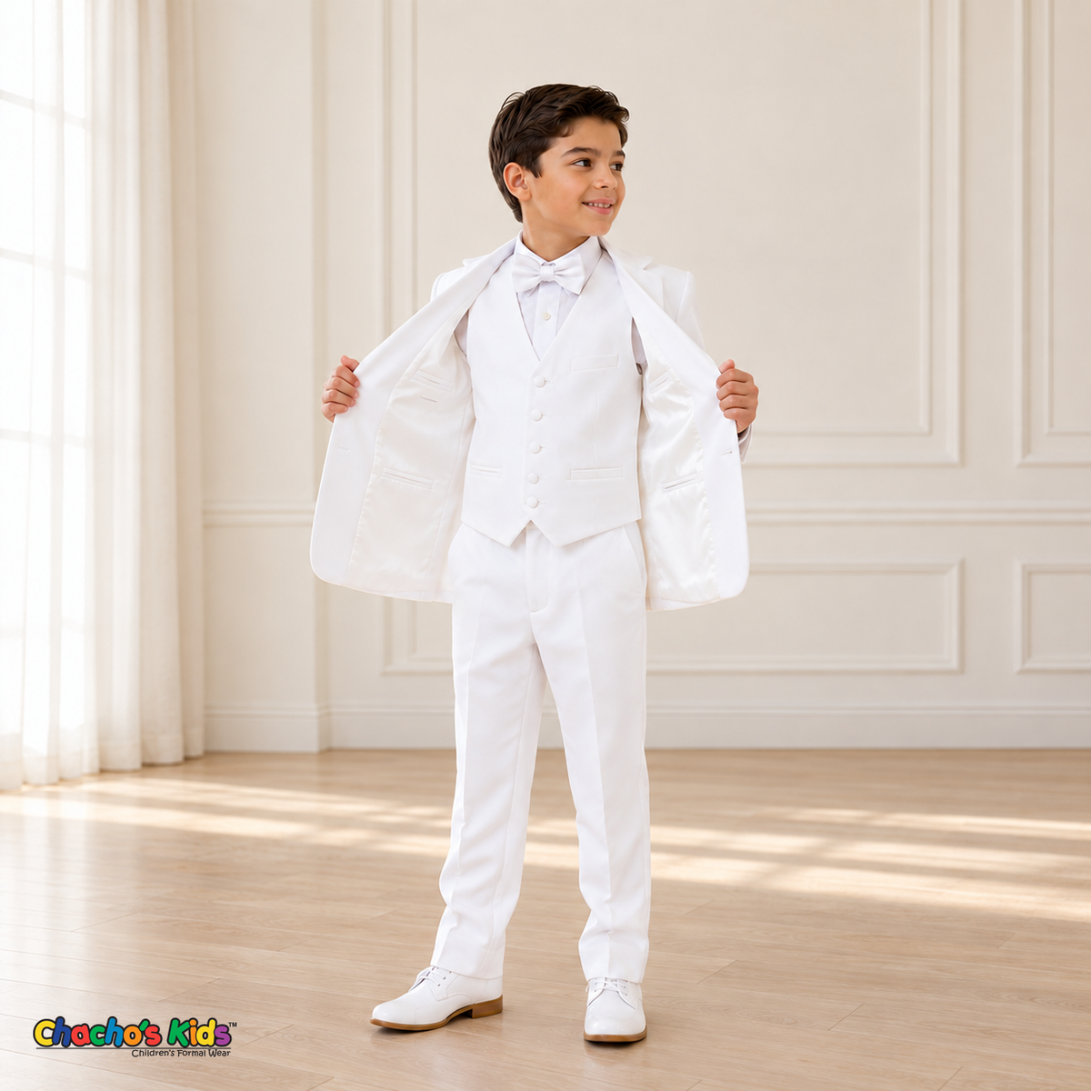Boys Signature Tuxedo in White (BY010), open-jacket pose showing the white vest and satin lining.