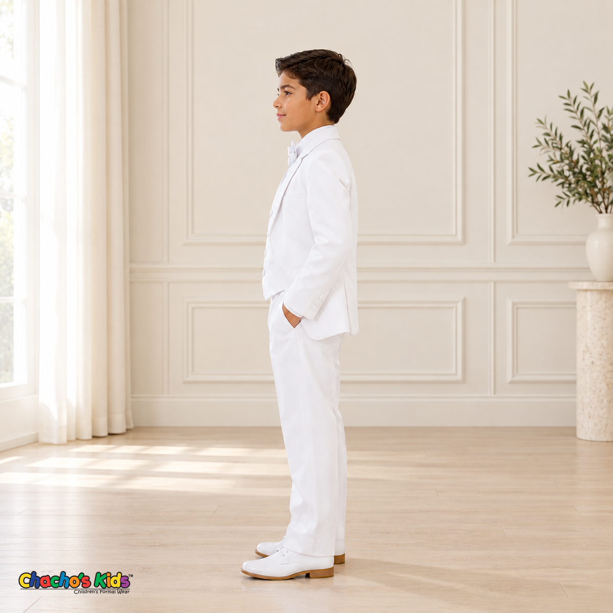 Boys Signature Tuxedo in White (BY010), left-facing side view showing the white jacket and trousers.