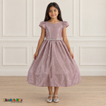 Front view of a girl wearing the blush shimmer puff sleeve party dress, Style 444, with a jeweled waist and full gathered skirt.