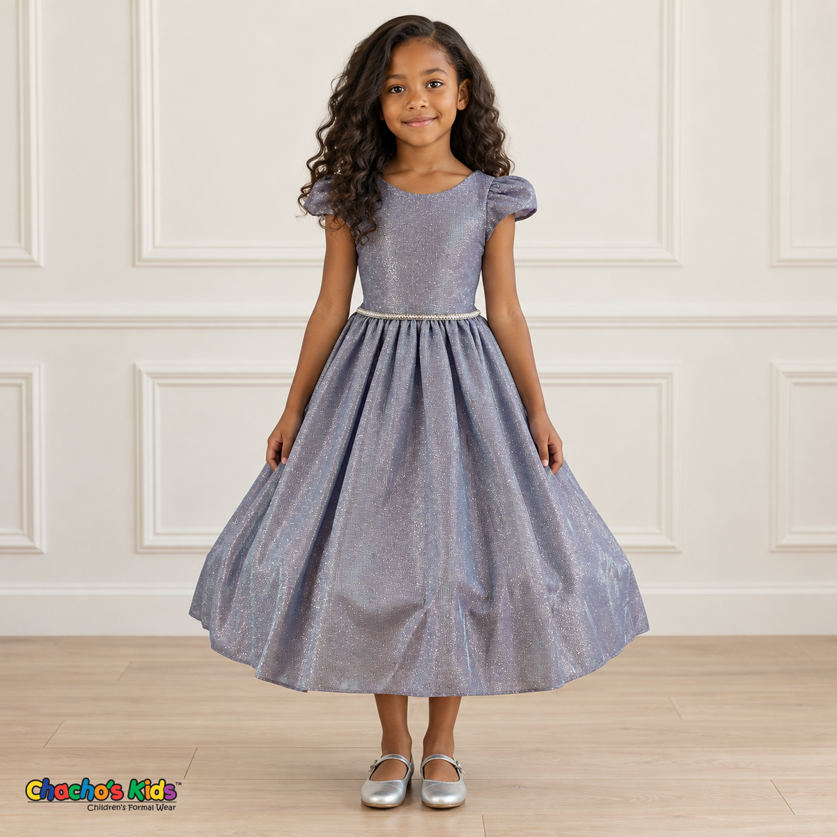 Front view of a girl wearing the lilac shimmer puff sleeve party dress, Style 444, with a jeweled waist and full gathered skirt.