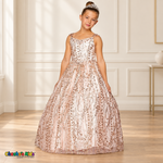 Girl wearing the Blush Glitter Sweetheart Ball Gown (8007), with floral sequins, jeweled trim and a full tulle skirt.