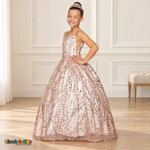 Three-quarter view of the Blush Glitter Sweetheart Ball Gown (8007), showing its sweetheart bodice, mesh side panel and glitter skirt.