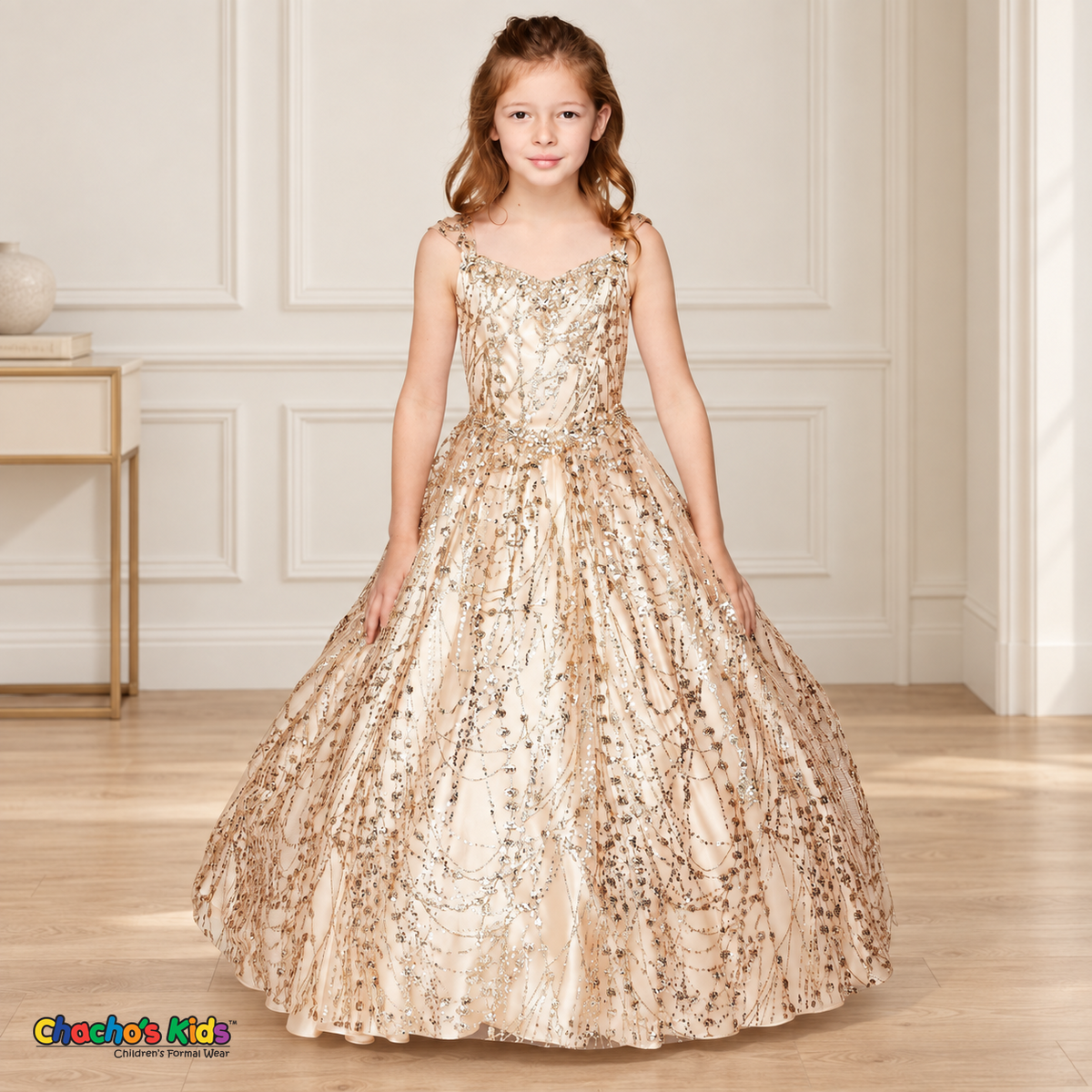 Girl wearing the Champagne Glitter Sweetheart Ball Gown (8007), showing floral sequins, jeweled waist and full floor-length skirt.