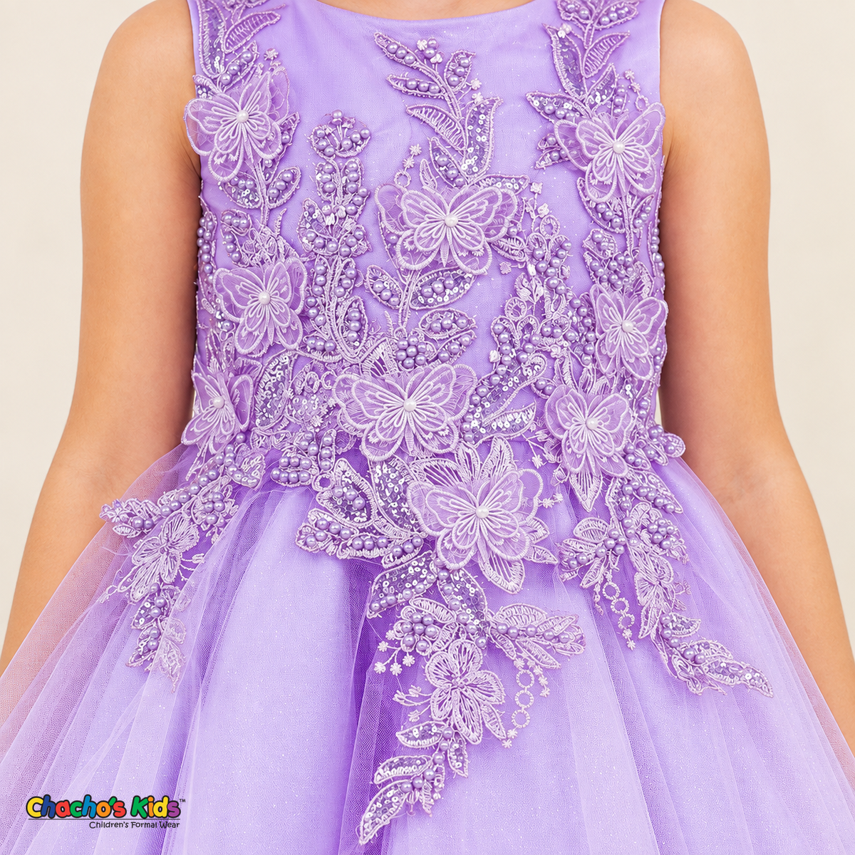 Close-up of the lilac Style 9150 dress bodice with butterfly appliqués, embroidered vines, pearl beads, and sequins.