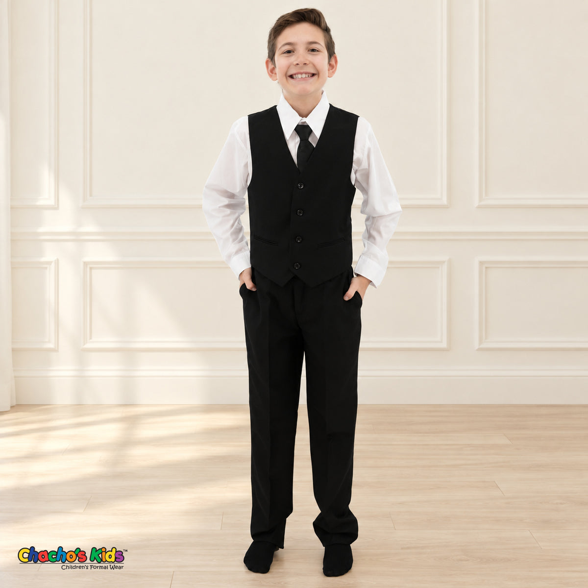 Black BJ4005 Executive boys suit on the existing child model without the coat, front view showing the four-button vest, white shirt, black tie and trousers.