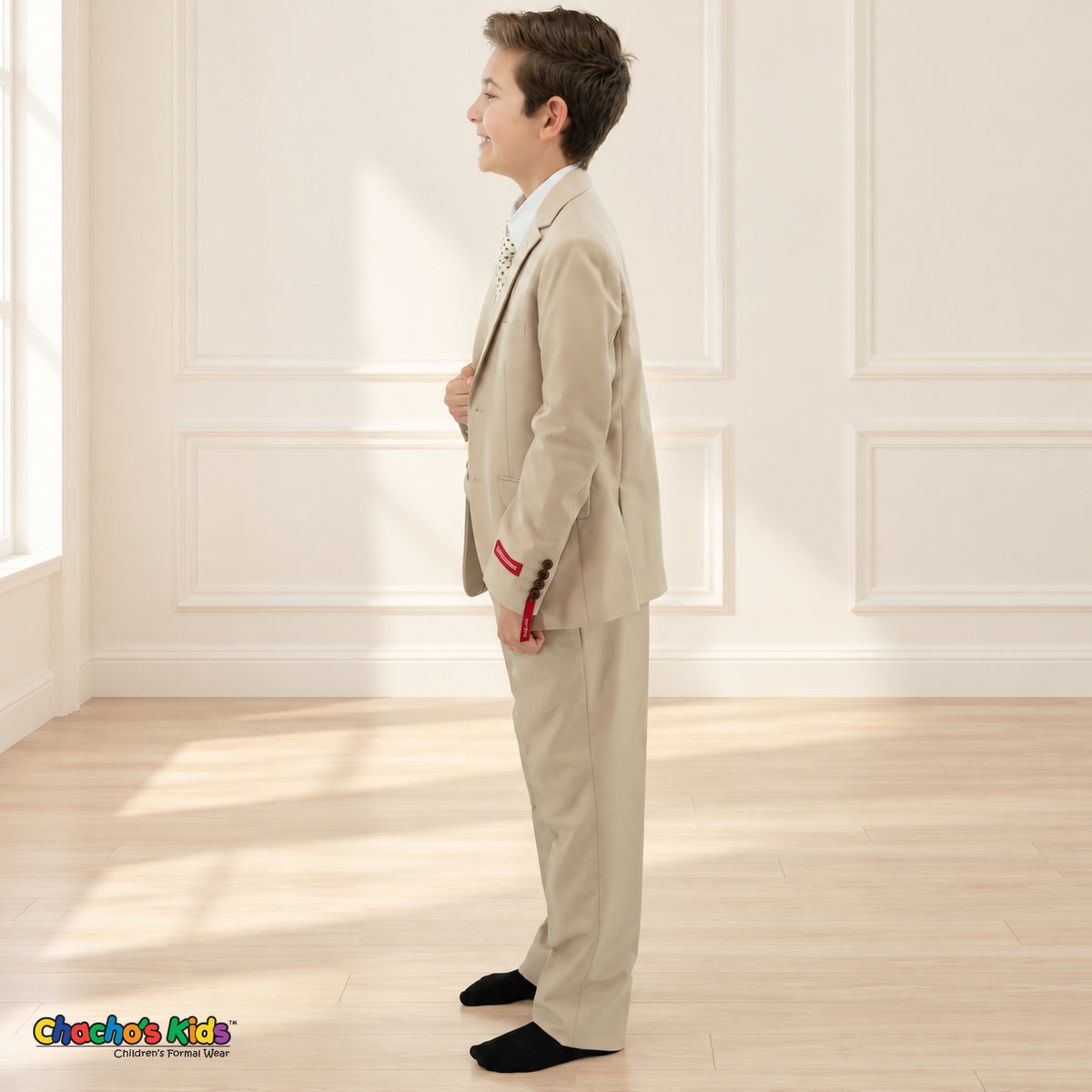 Khaki BJ4005 Premium Executive boys suit, coat left side view showing the jacket and matching trousers.