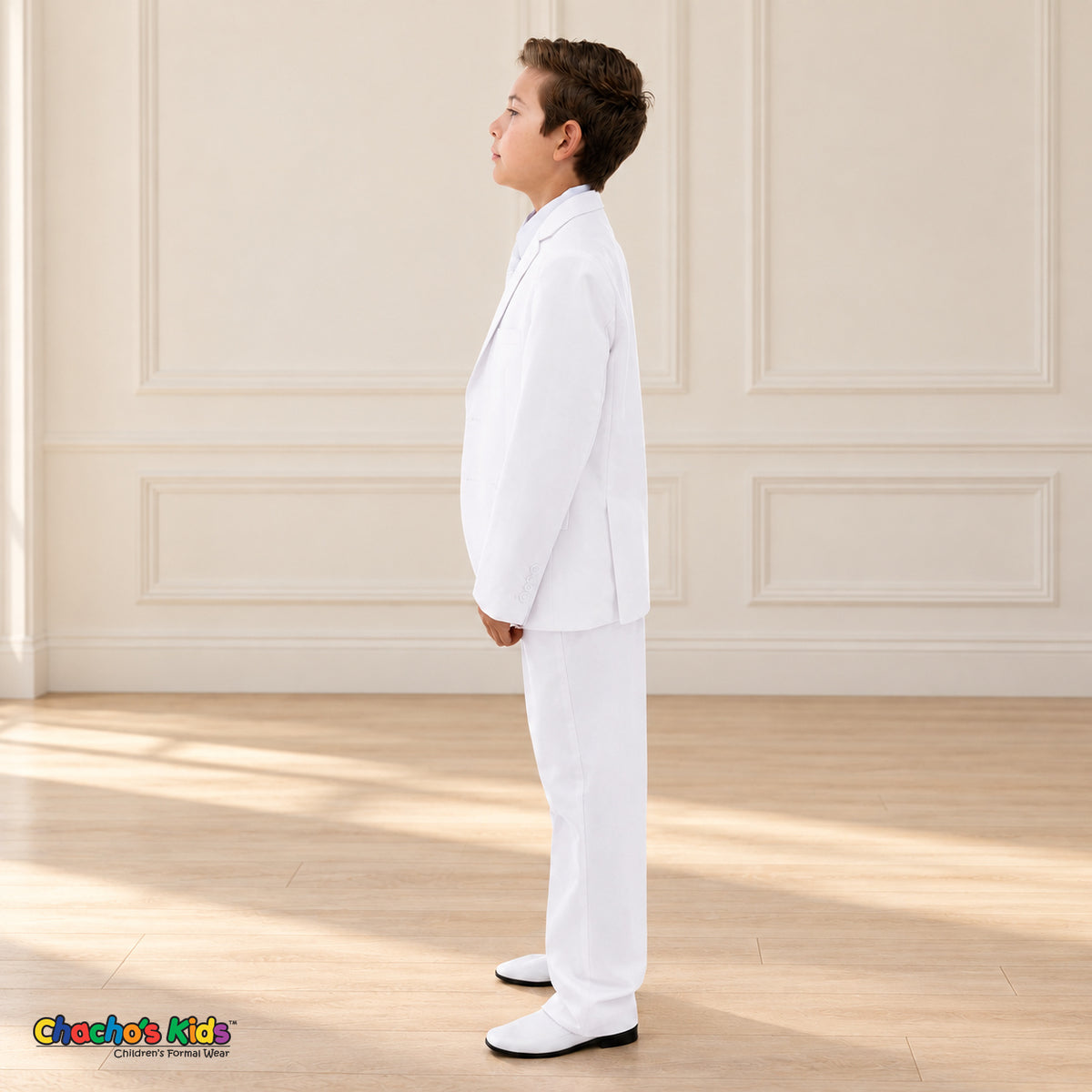 White BJ4005 Premium Executive boys suit, coat side view showing the notched lapels, sleeve buttons and matching trousers.