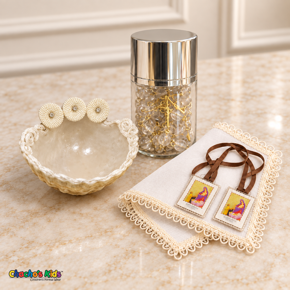 Natural baptism shell, gold-tone rosary in a silver-capped jar, ivory handkerchief and brown-ribbon scapular