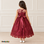 Girl wearing the Burgundy Floral Embroidered Dress, Style D1550, back view, showing the embroidered sheer back, zipper and satin bow.