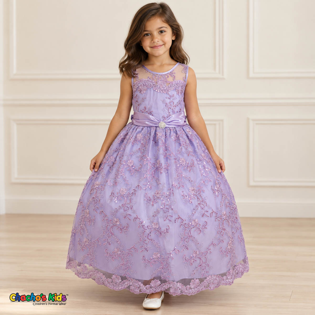 Girl wearing the Lilac Floral Embroidered Dress, Style D1550, front view, showing floral embroidery, a sheer neckline and a decorated satin sash.