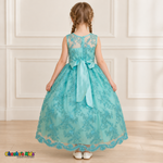 Girl wearing the Mint Green Floral Embroidered Dress, Style D1550, back view, showing the embroidered sheer back, zipper and satin bow.
