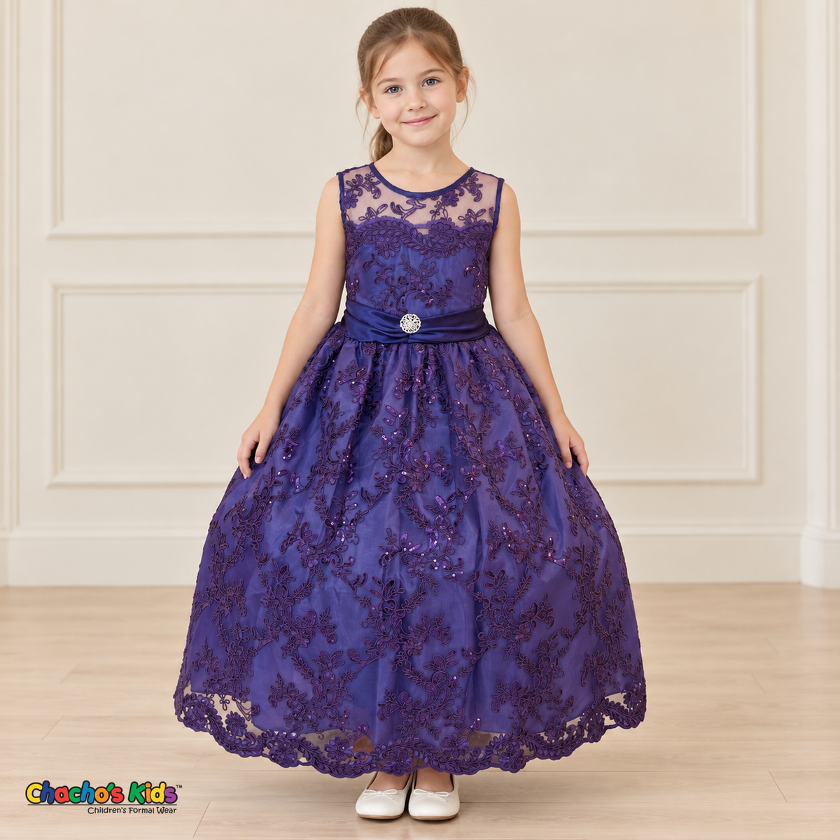 Girl wearing the Purple Floral Embroidered Dress, Style D1550, front view, showing floral embroidery, a sheer neckline and a decorated satin sash.