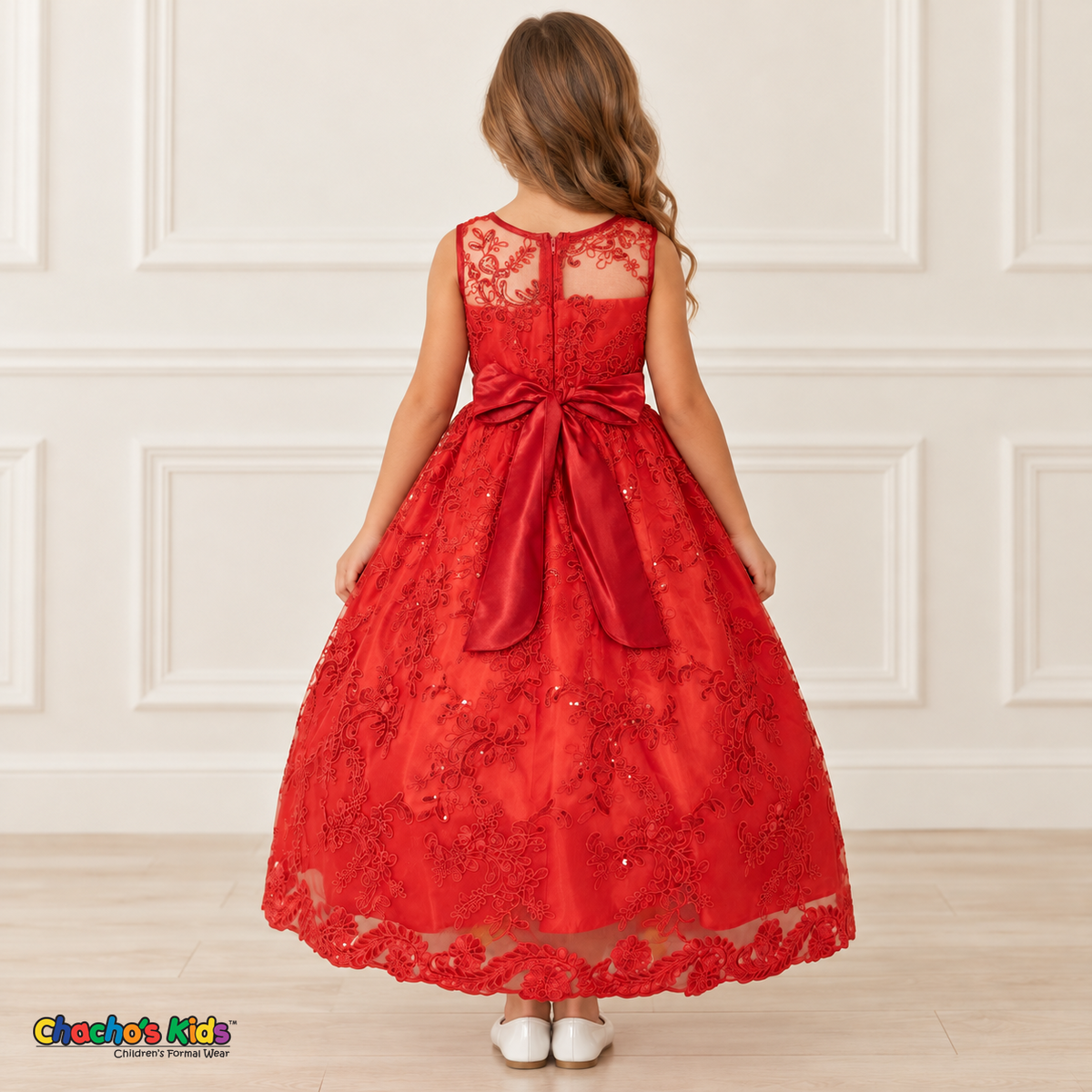 Girl wearing the Red Floral Embroidered Dress, Style D1550, back view, showing the embroidered sheer back, zipper and satin bow.