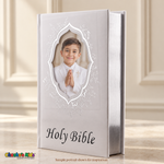 Large English Holy Bible with white hardcover and silver floral details, with a sample First Communion portrait and silver page edges