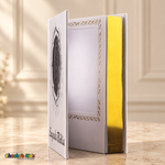 Large Spanish Holy Bible with white cover and gold details — open view showing the interior photo pocket and reflective page edges