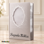 Large Spanish Holy Bible with white cover and silver details — front view with blank portrait window and reflective page edges