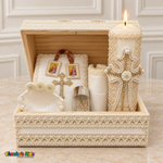 Open ivory wooden keepsake chest holding the boys baptism candle, cross Bible, shell, gold-tone rosary in a jar, scapular, and handkerchief.