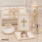Complete seven-piece ivory boys baptism set with cross keepsake chest, lit candle, Bible, shell, rosary jar, brown-ribbon scapular, and handkerchief.