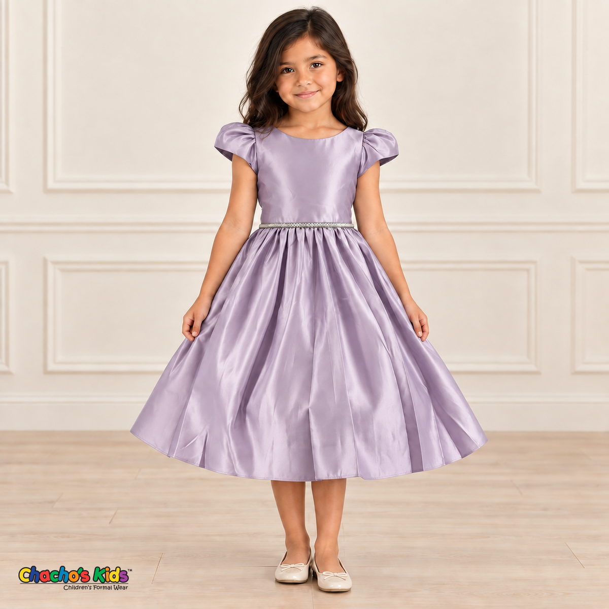 Girl wearing a lilac satin party dress with puff sleeves, a jeweled waist and a full gathered skirt, front view.