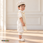 Ivory Otto boys baptism four-piece outfit, ivory right side showing the matching hat, shirt, romper and embroidered stole.