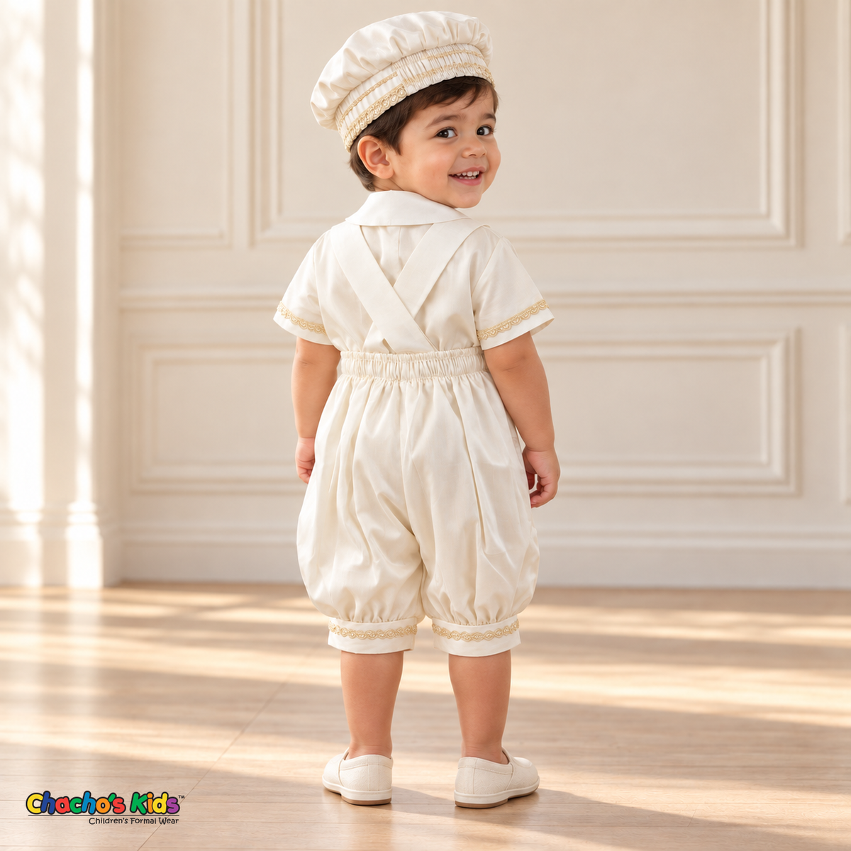 Ivory Otto boys baptism four-piece outfit, ivory romper back showing the matching hat, shirt, romper and no stole.