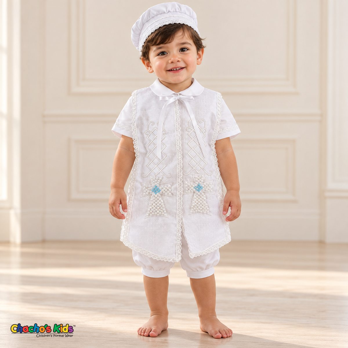 White Otto boys baptism four-piece outfit, white full front showing the matching hat, shirt, romper and embroidered stole.
