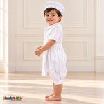 White Otto boys baptism four-piece outfit, white left side showing the matching hat, shirt, romper and embroidered stole.
