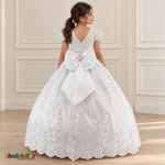 Back view of the white Victorian Heirloom Embroidered Dress R130, showing the V-shaped neckline, zipper and oversized bow with pink flower center.