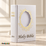 Small English Holy Bible with white hardcover and gold-tone details, showing the blank ornate photo window