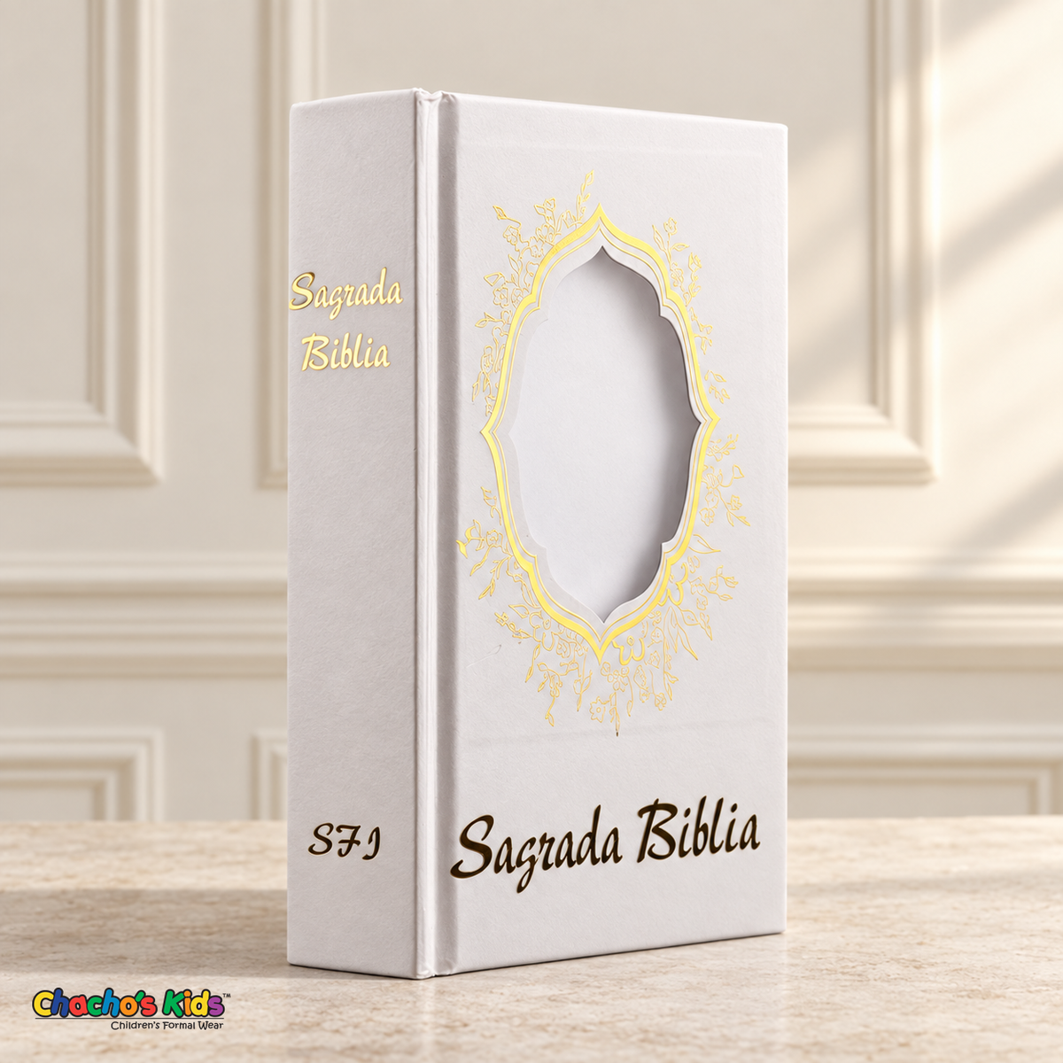 Small Spanish Holy Bible with white hardcover and gold-tone details, showing the blank ornate photo window